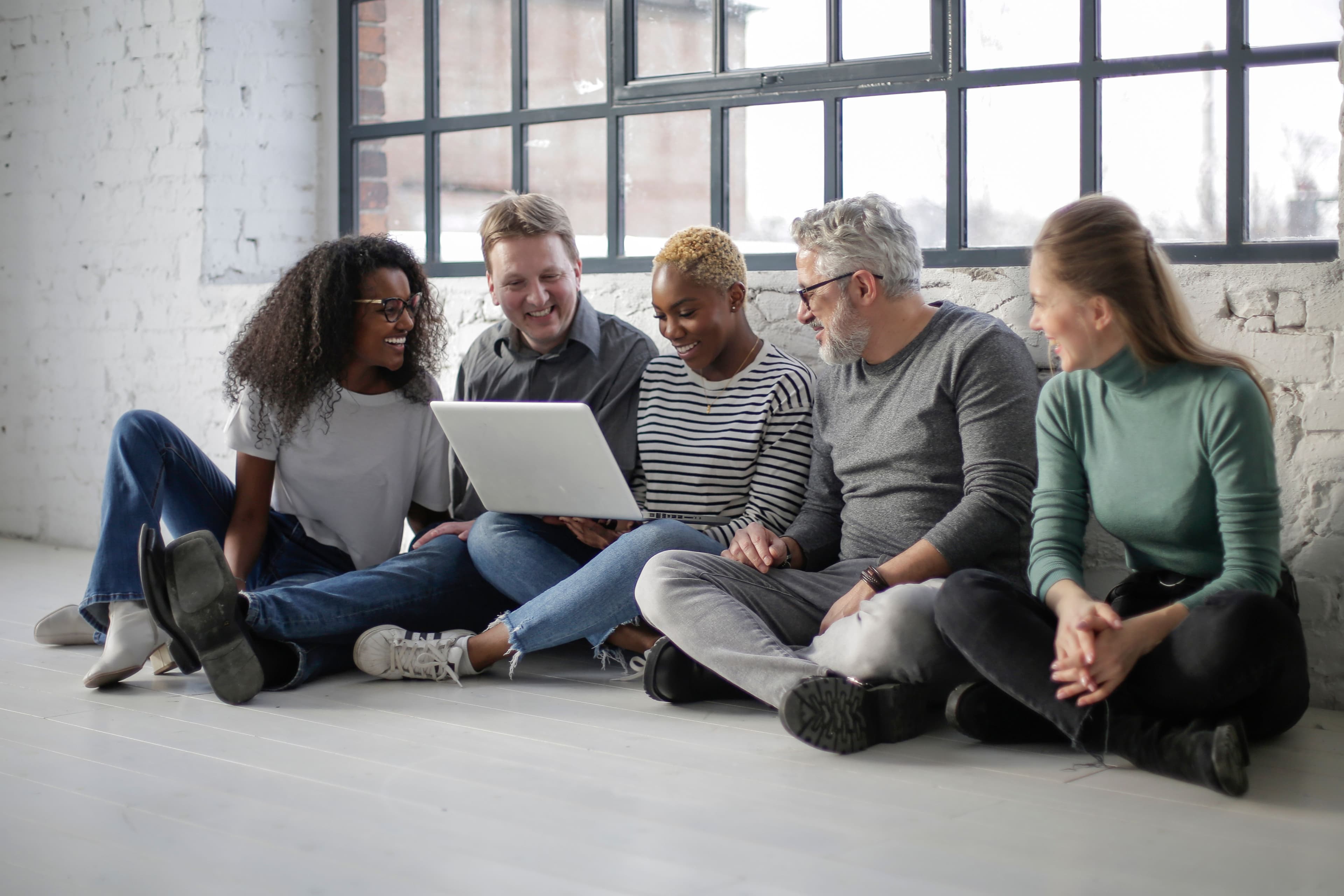 Accountants collaborating on client books